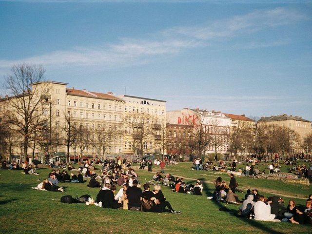 Busy city park where a CPR training kiosk can reach residents